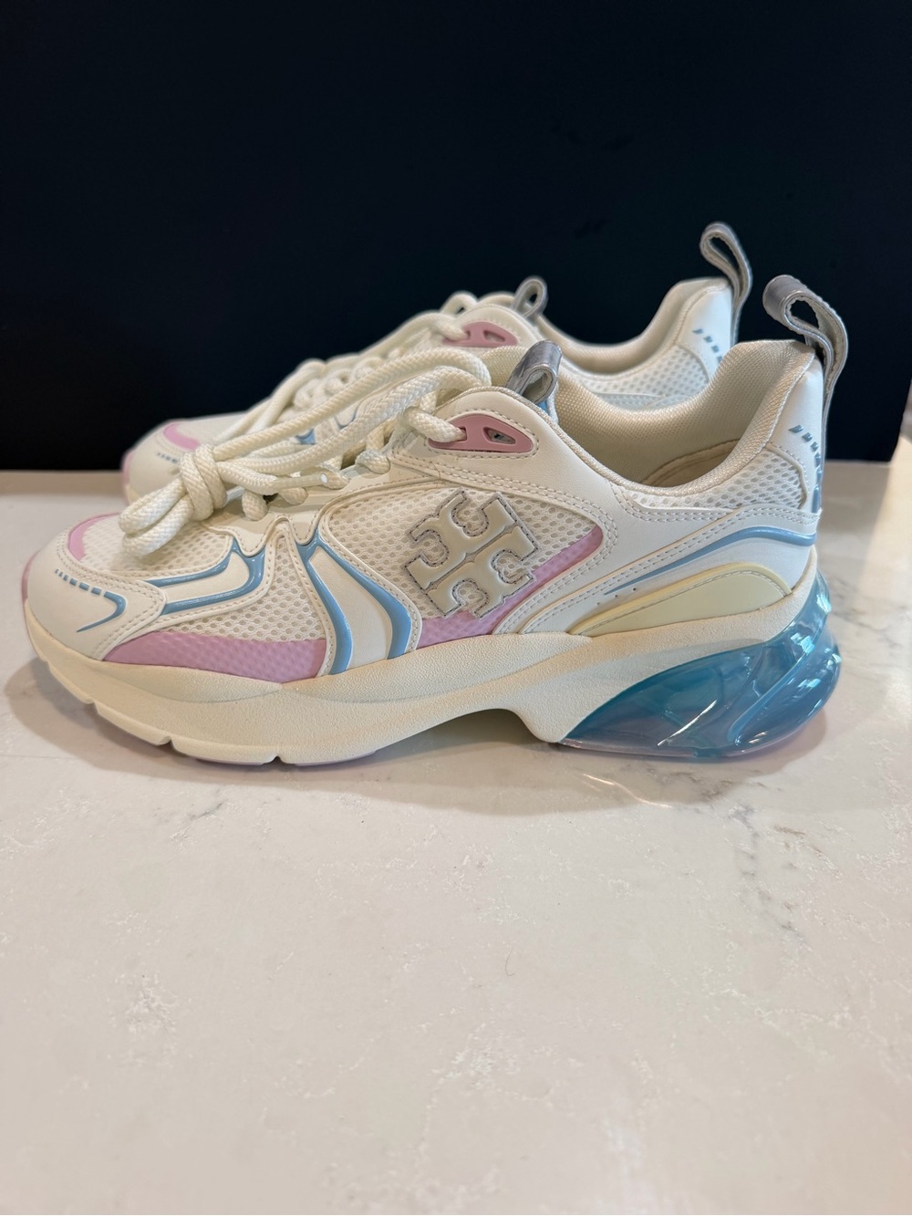 Tory Burch “Good Luck” Tech Trainers with Pastel Pink and Blue Accents